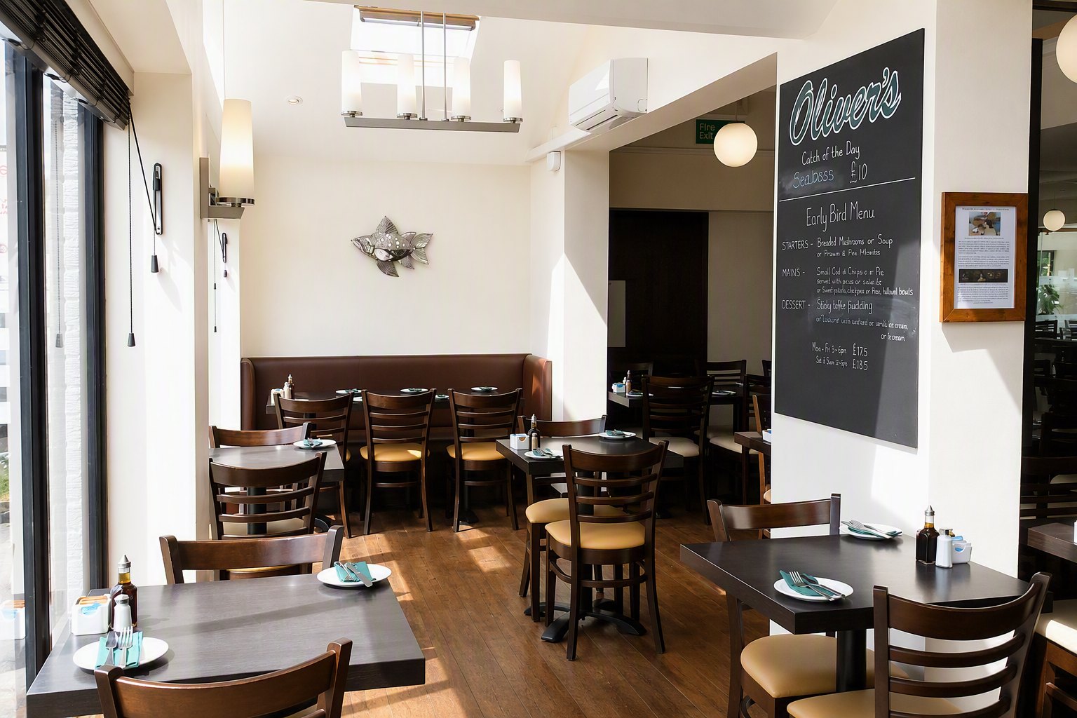 Oliver's restaurant dining area and chalkboard menu